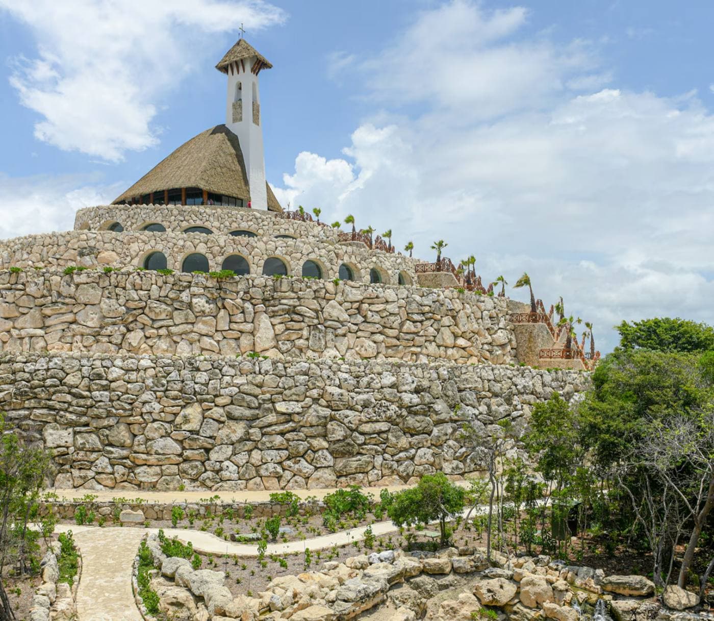 The stone pyramid and its chapel seen from the plaza below
